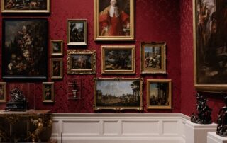 image of a gallery wall with paintings