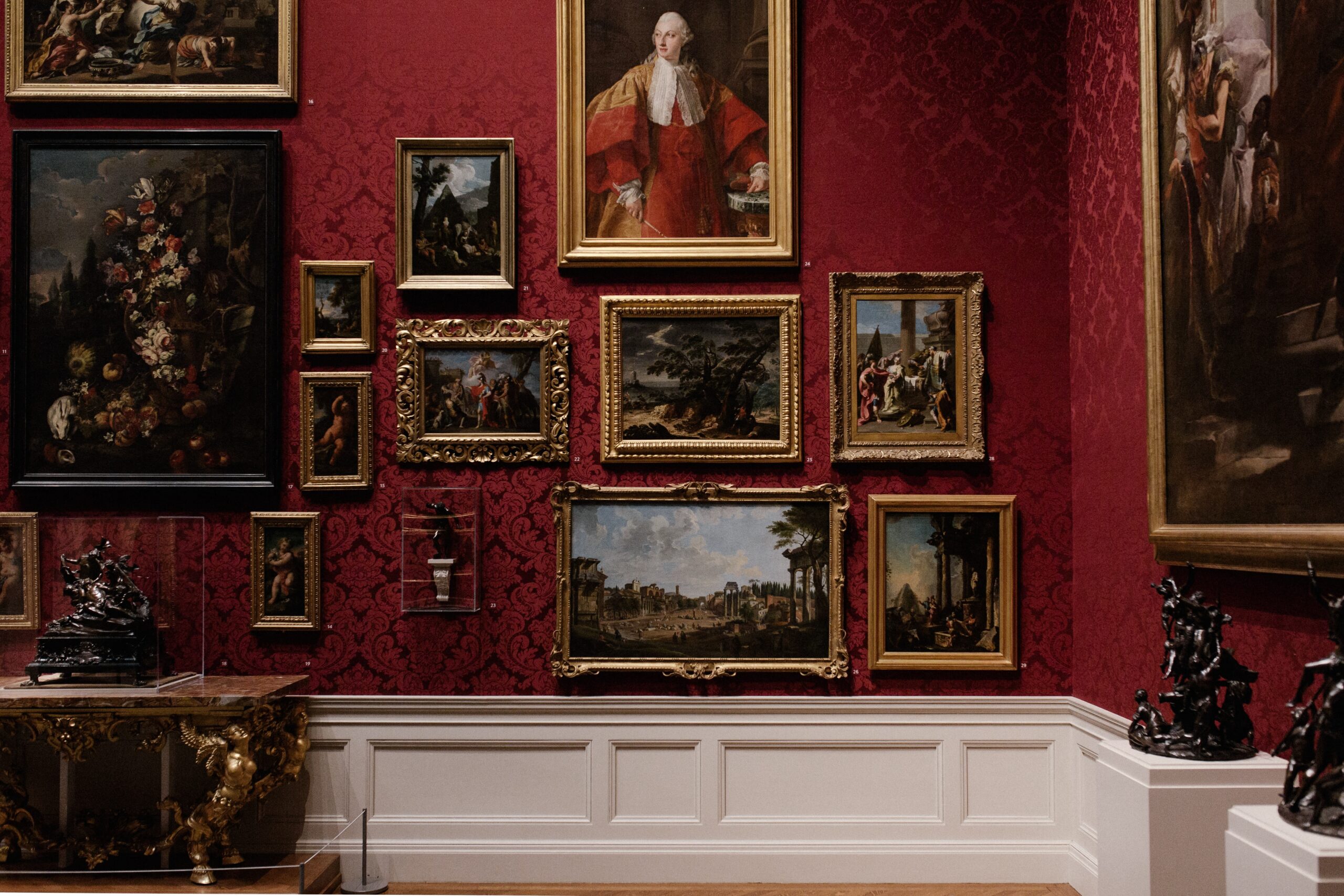image of a gallery wall with paintings