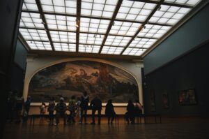 an image of a large painting in a gallery for blog How Much Does Art Transport Cost?