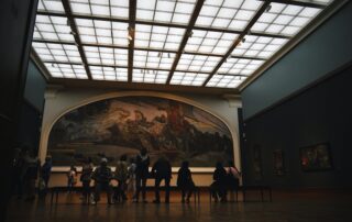 an image of a large painting in a gallery for blog How Much Does Art Transport Cost?